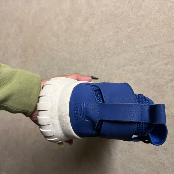 Blue and white Adidas